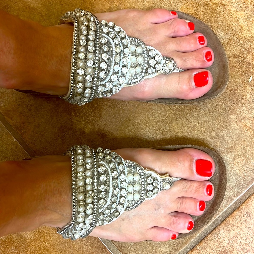 Adorable “Not Rated” diamonds and pearl slip on sandals.